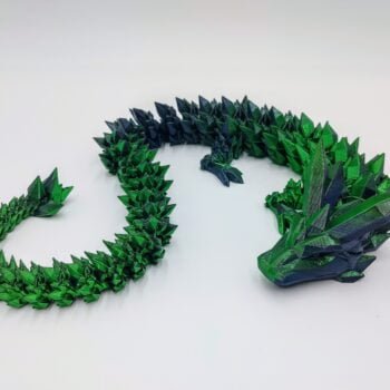 Articulated Crystal Dragon 3D Printed in Black to Green Articulated Crystal Dragon Sensory Toy Designed by Cinderwing3d in Black to Green with a White Background