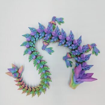 Articulated Crystal Dragon Sensory Toy Designed by Cinderwing3d in Fairy Floss Rainbow taken from Above with a White Background