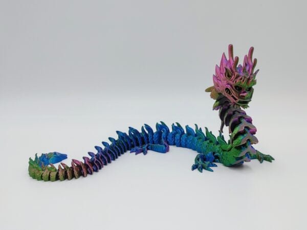 Articulated Imperial Dragon Sensory Toys Designed by Flexy Factory in Silk Tri Colour Red to Green to Blue with a White Background